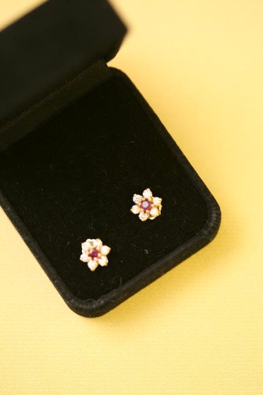 Appraisal: KYG RUBY AND DIAMOND FLORET STUDS Center rubies are mm