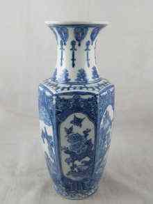 Appraisal: A tall Chinese blue and white vase with vignettes of