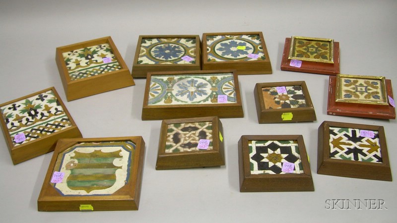 Appraisal: Twelve Framed Spanish Decorated Pottery Tiles x to x in