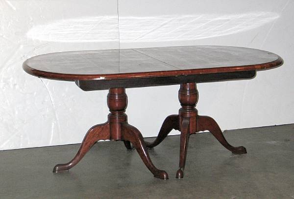 Appraisal: A George III style crossbanded burl walnut dining table with