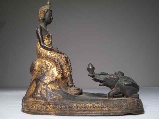 Appraisal: Asian cast metal gilded Buddha figurine Depicts a Buddha figure