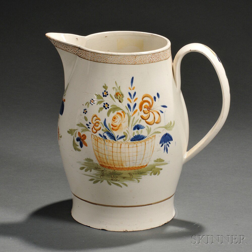 Appraisal: Polychrome Decorated Creamware Pitcher England early th century baluster form