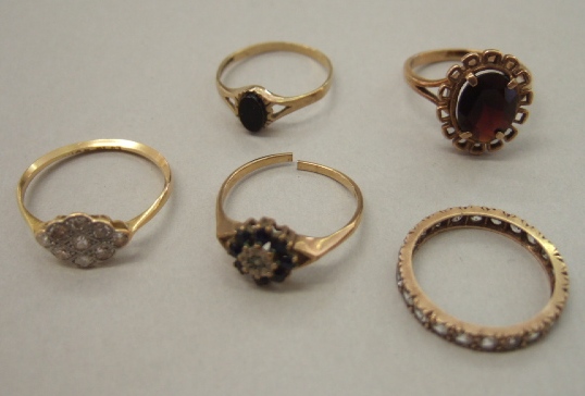 Appraisal: A gold and diamond set nine stone cluster ring mounted