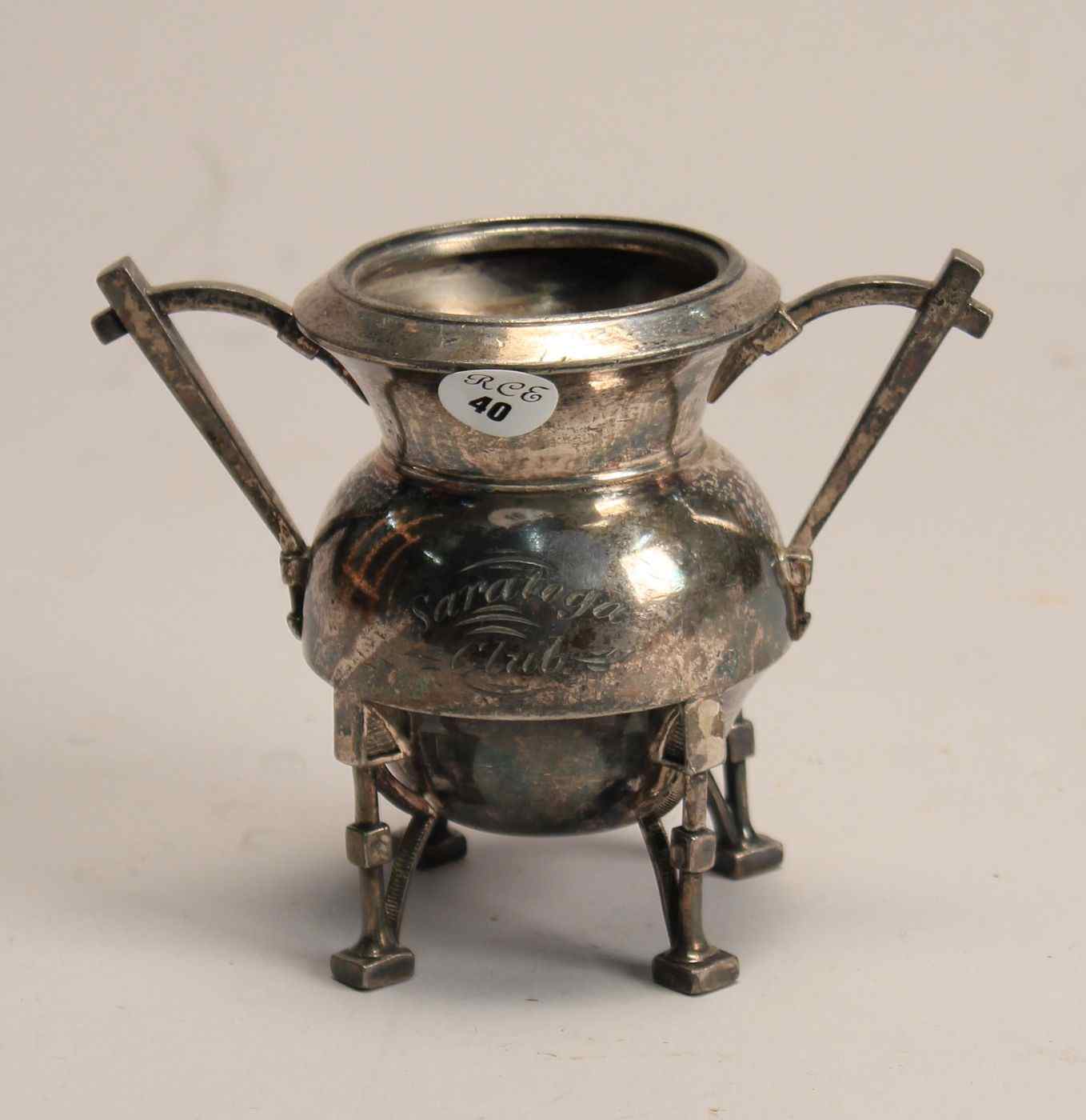 Appraisal: SILVER PLATED TWO-HANDLED TROPHY th CenturyIn the Eastlake style Inscribed