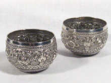 Appraisal: A pair of heavily embossed Indian salts