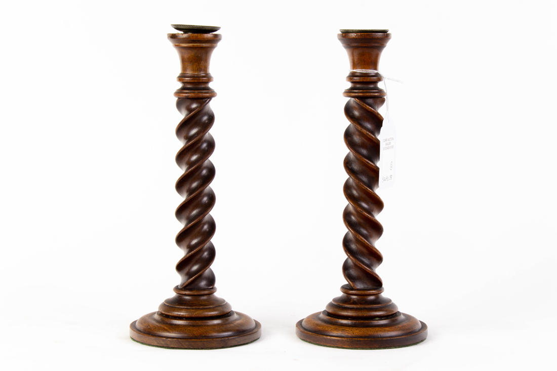 Appraisal: Pair of English style carved barley twist candlesticks h Provenance