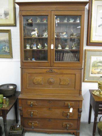 Appraisal: Victorian Walnut Secretary Bookcase double doors over triple drawers with