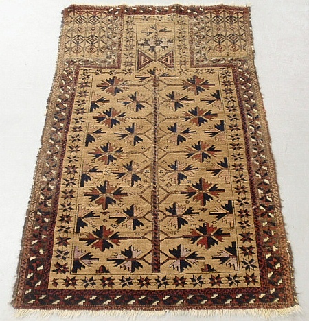 Appraisal: - Oriental prayer carpet with geometric medallion x -