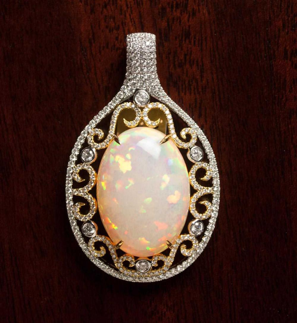 Appraisal: OPAL DIAMOND AND FOURTEEN KARAT GOLD PENDANT The k white