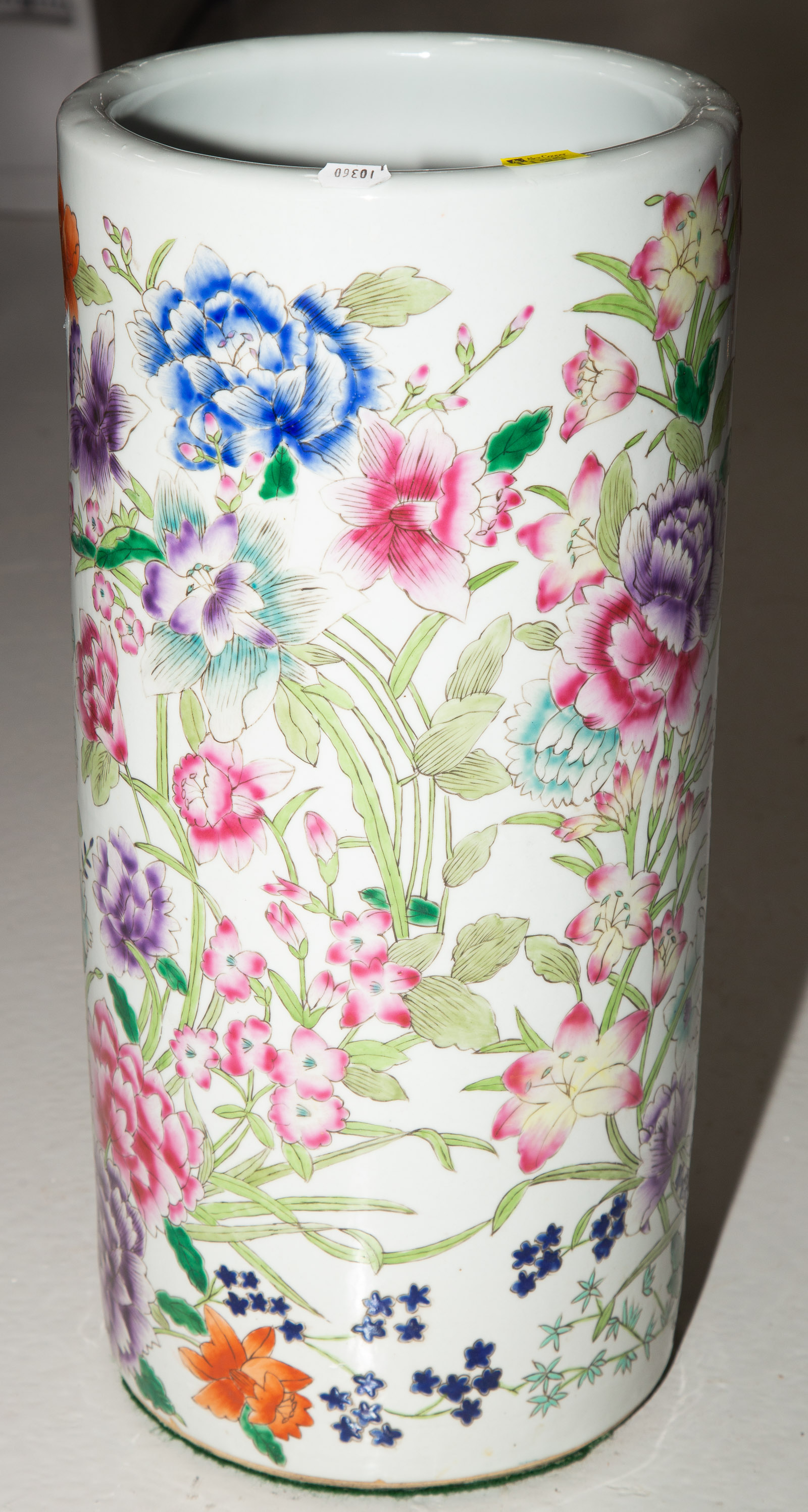 Appraisal: MODERN CHINESE PORCELAIN UMBRELLA STAND With hand-painted floral design in