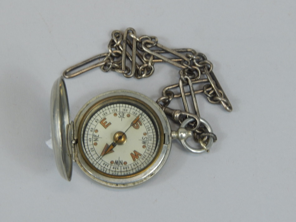 Appraisal: A World War I silver plated military compass stamped F