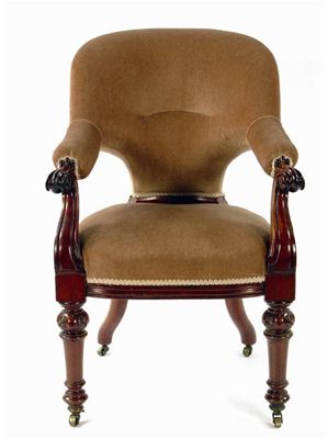 Appraisal: A Victorian mahogany library open armchair the upholstered arms and