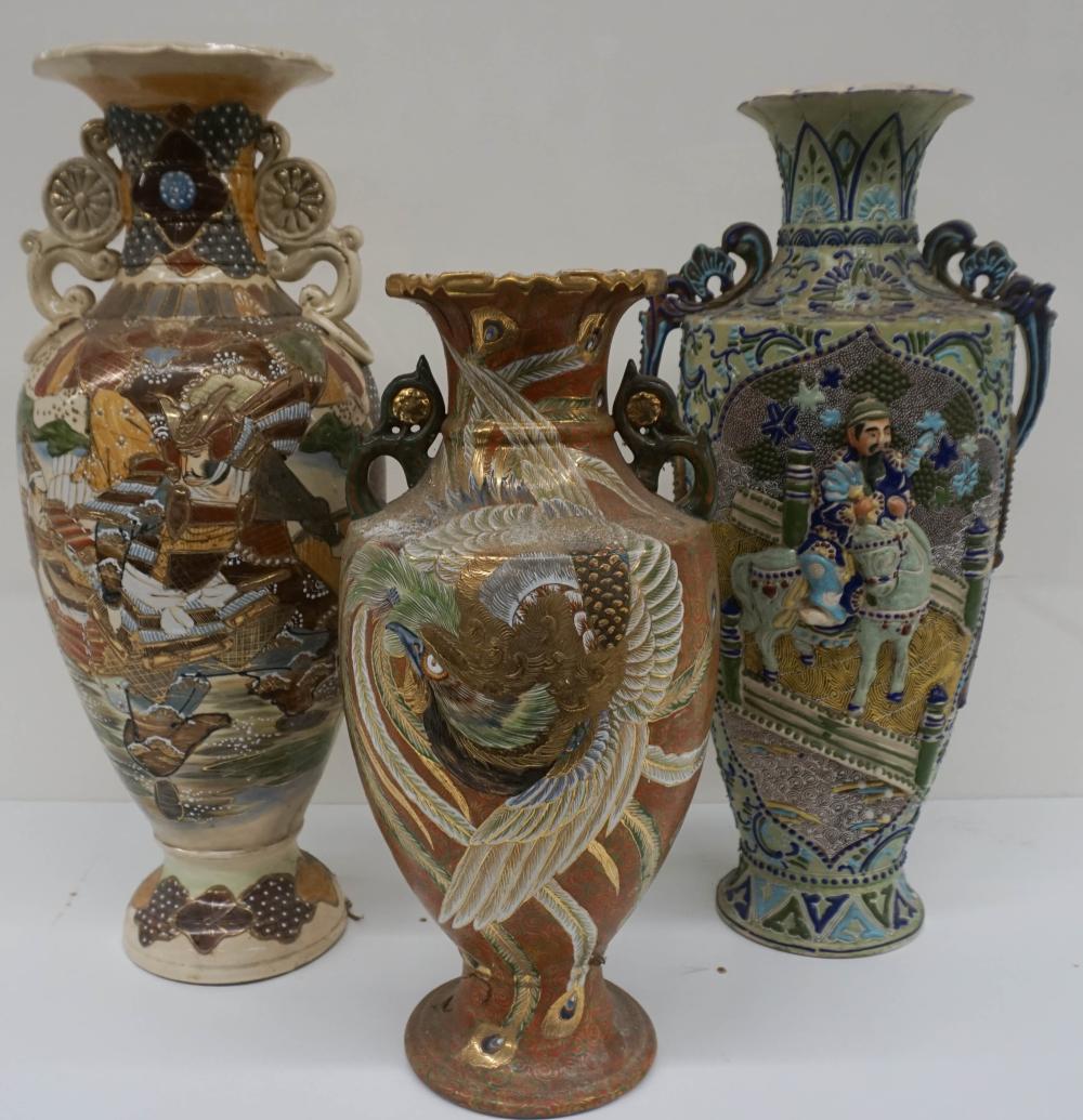 Appraisal: THREE JAPANESE EARTHENWARE POLYCHROME DECORATED VASES H OF TALLEST IN