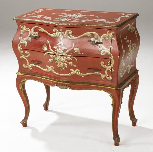 Appraisal: DECORATIVE Two-drawer bombe chest with carved details and hand-painted decorations