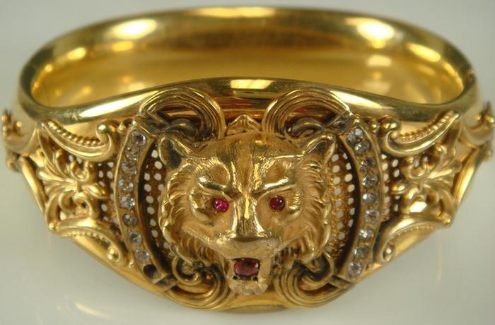 Appraisal: Gold-Filled Lion Head Bangle Bracelet Elaborately decorated with a lion's