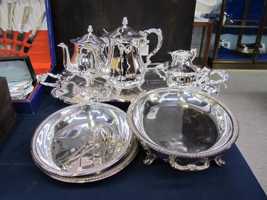 Appraisal: Lot comprising a silver plated four piece tea service on