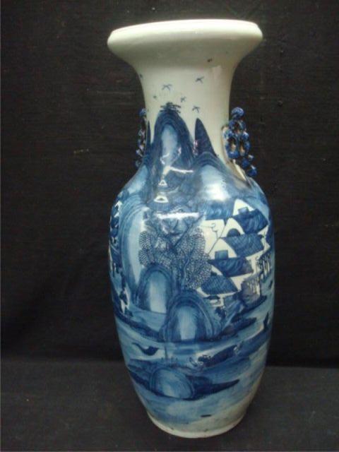 Appraisal: Asian Porcelain Vase with Handles and Flow Blue Decoration From