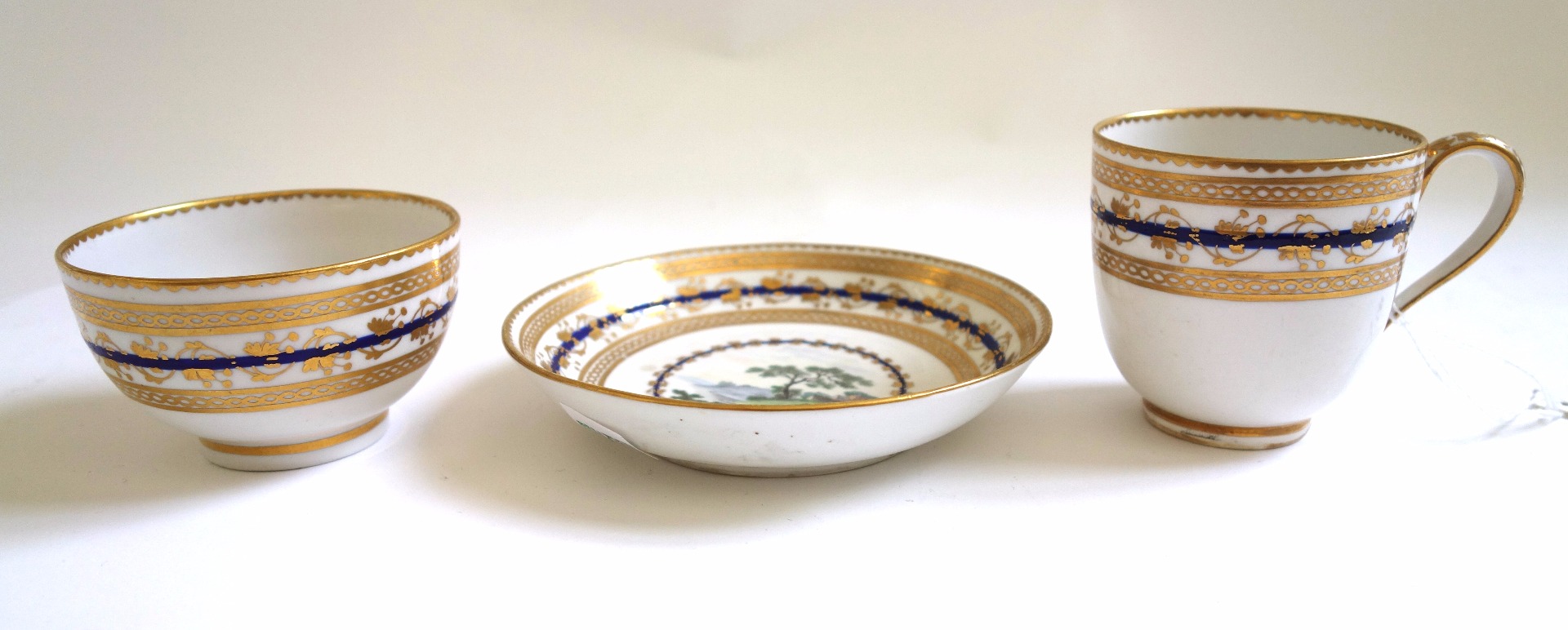 Appraisal: A Derby porcelain trio circa painted with pattern a landscape