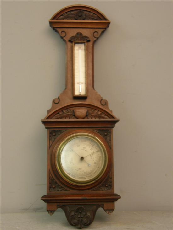 Appraisal: th century carved walnut barometer dial signed James Lucking Co