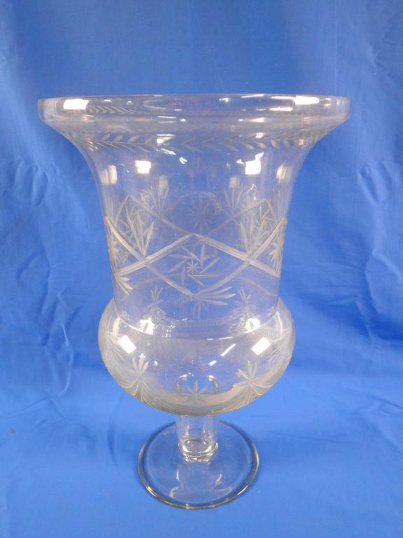 Appraisal: A cut glass urn in thC style decorated with leaves