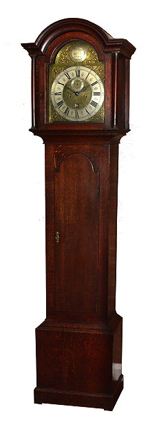 Appraisal: A GEORGE III OAK LONGCASE CLOCK the arched brass dial