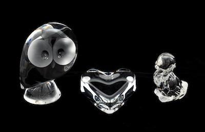 Appraisal: A Group of Clear Glass Paperweights by Steuben Baccarat and