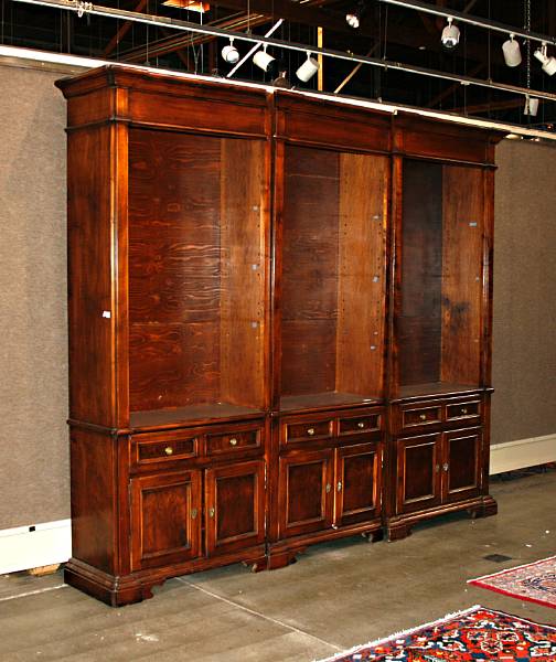 Appraisal: A George III style stained hardwood bookcase cabinet height ft