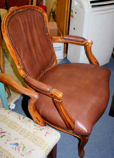 Appraisal: A LOUIS XV STYLE BEECH WOOD FAUTEUIL CHAIR upholstered in