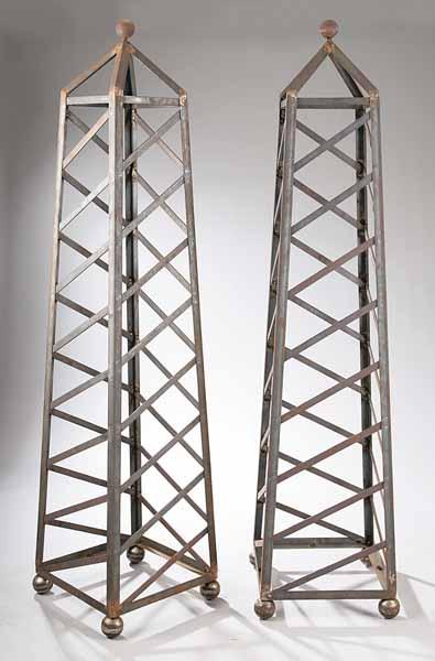 Appraisal: A Pair of Iron Topiaries in the Form of Obelisks