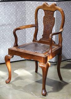 Appraisal: Chinese Wooden Chair with Leather Seat Chinese hardwood arm chair