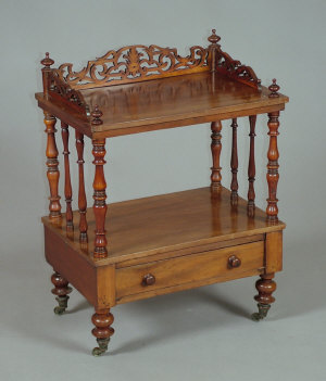 Appraisal: A Victorian mahogany two tier whatnot the top with pierced