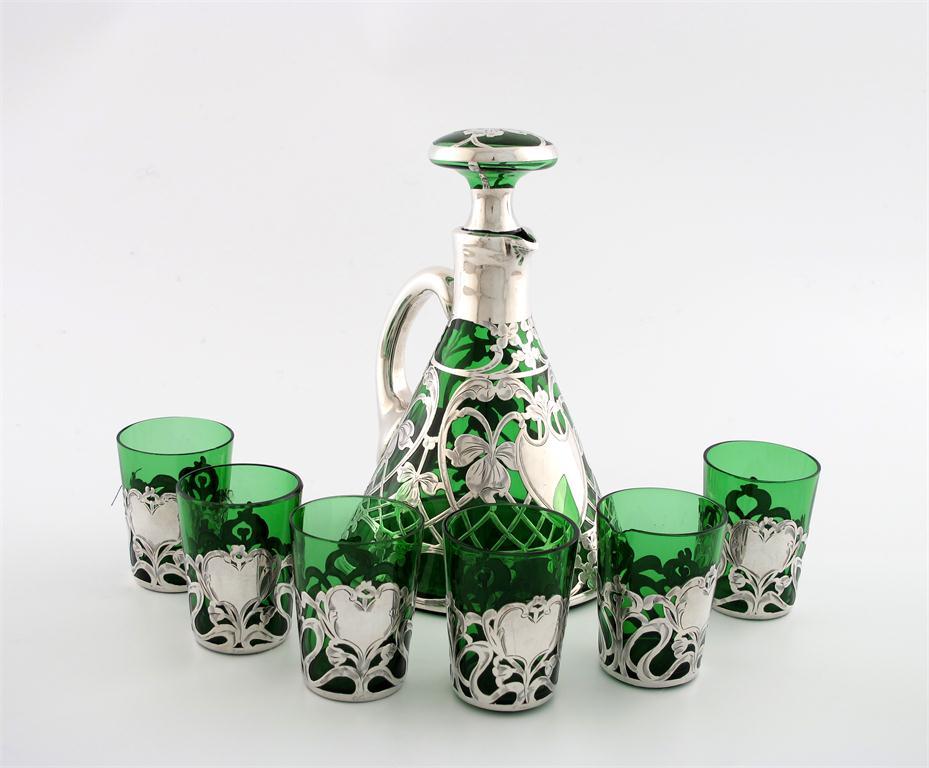 Appraisal: A late th century American silver overlay green glass decanter