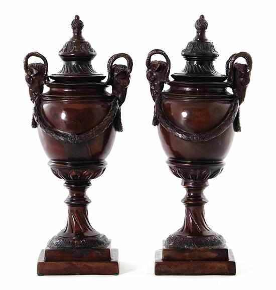 Appraisal: Pair Classical bronze covered urns garland swag on pedestaled vessel