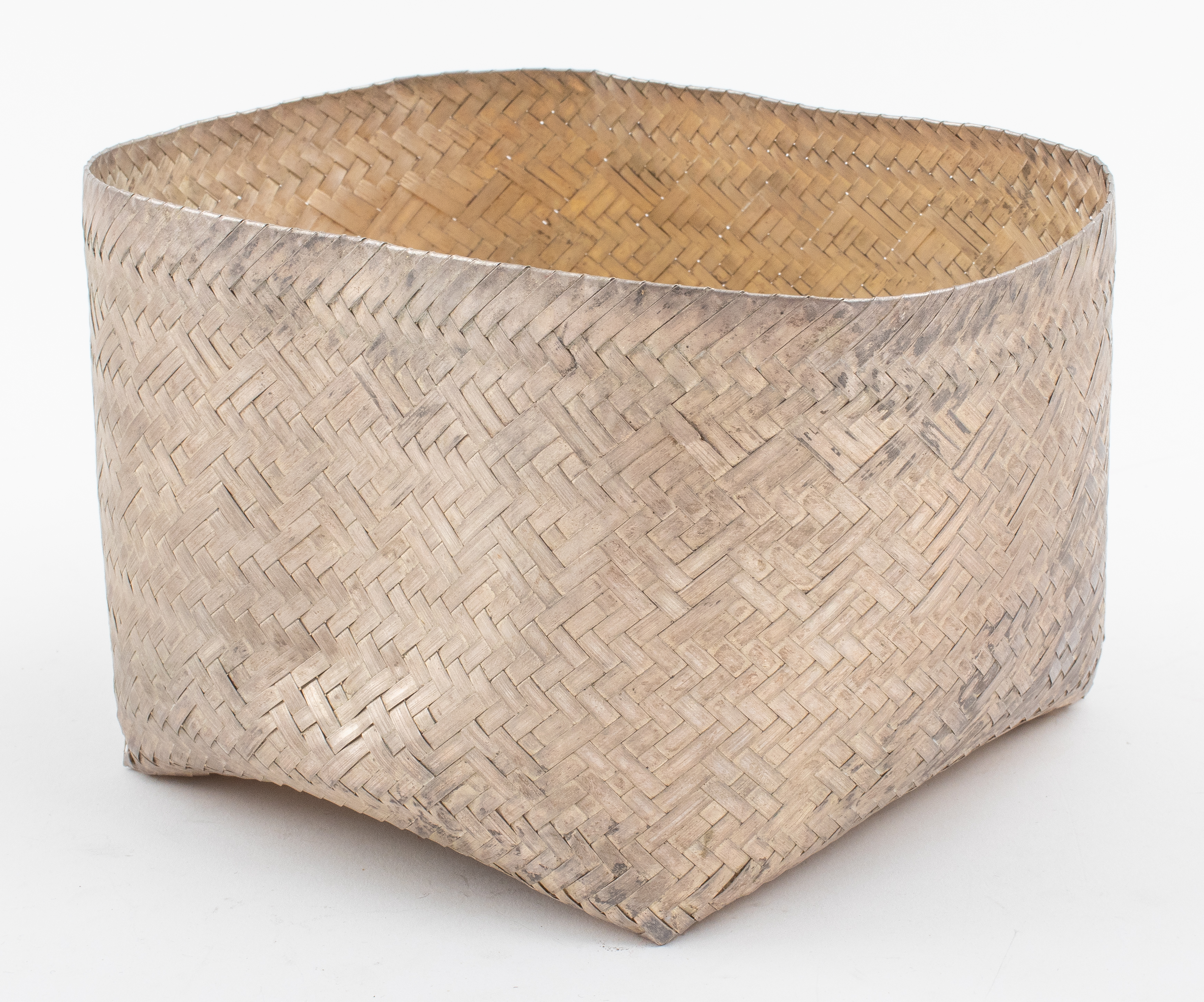 Appraisal: SILVER-TONED METAL WOVEN BASKET Silver-toned metal woven basket unmarked H