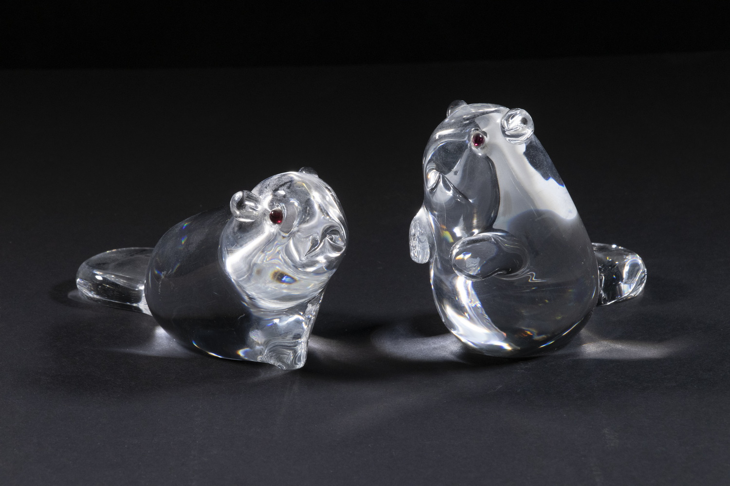 Appraisal: STEUBEN ART GLASS BEAVER FIGURES Lot of Clear Glass Beaver