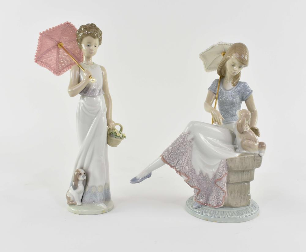 Appraisal: TWO LLADRO PORCELAIN YOUNG LADIES WITH UMBRELLASTWO LLADRO PORCELAIN YOUNG