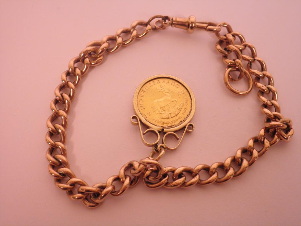 Appraisal: A gold rand with pendant mount and a carat gold