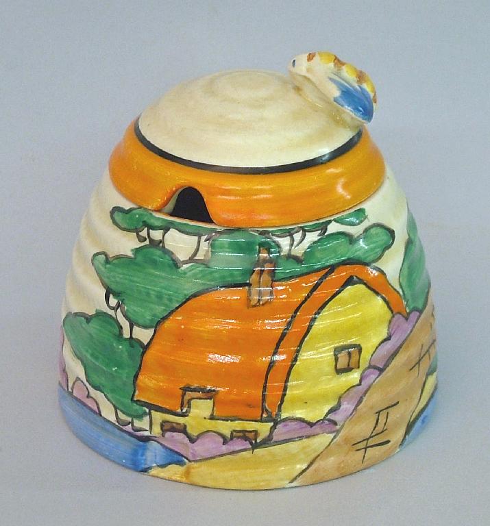 Appraisal: Orange Roof Cottage' Fantasque Bizarre beehive honey pot and cover