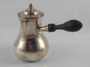 Appraisal: A silver side handled lidded cafe au lait pot with