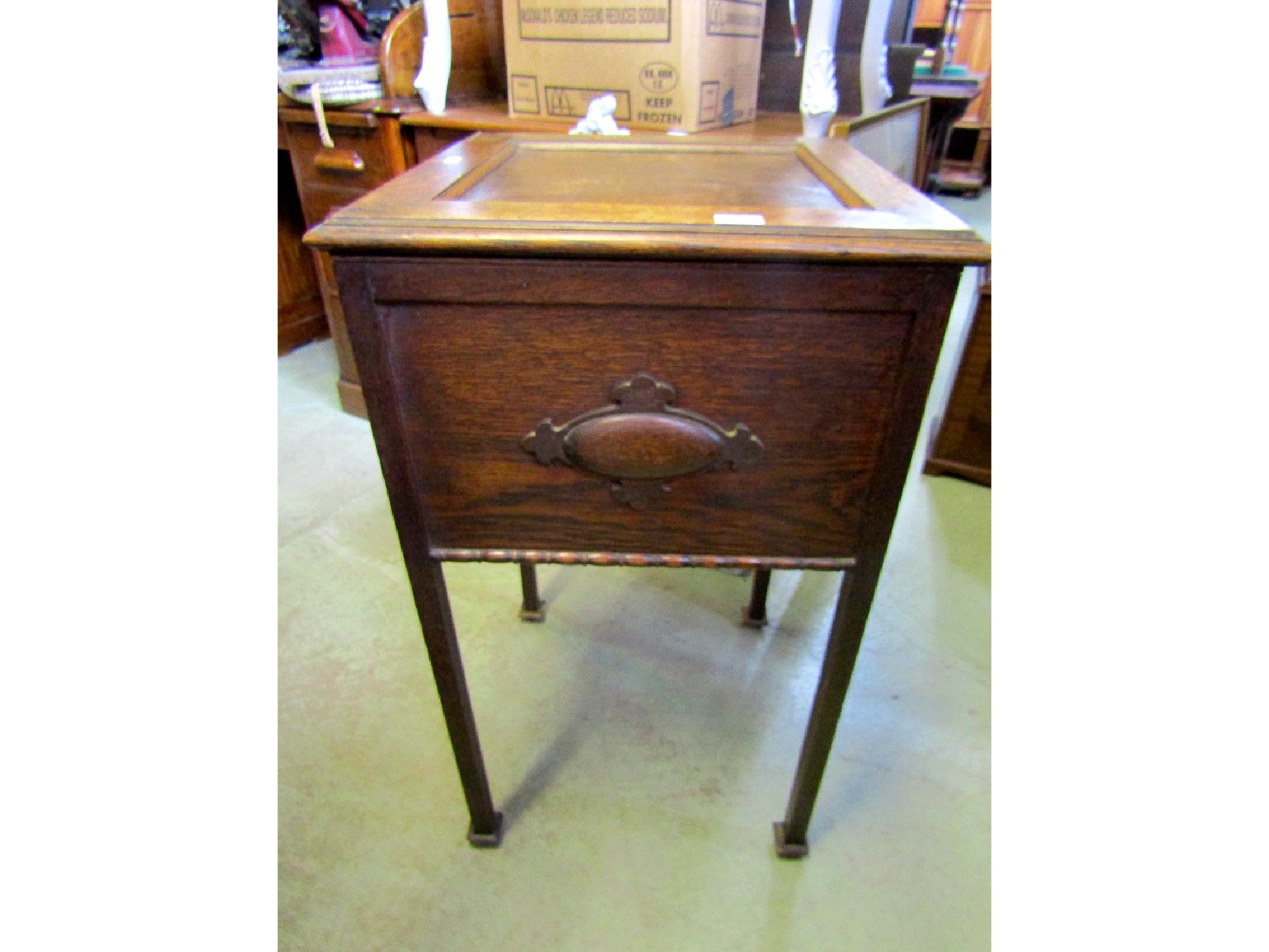 Appraisal: An oak floorstasnding sewing work box of square cut form