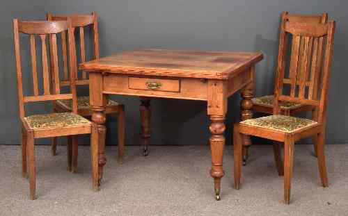 Appraisal: A late Victorian pitch pine drawleaf kitchen table on turned