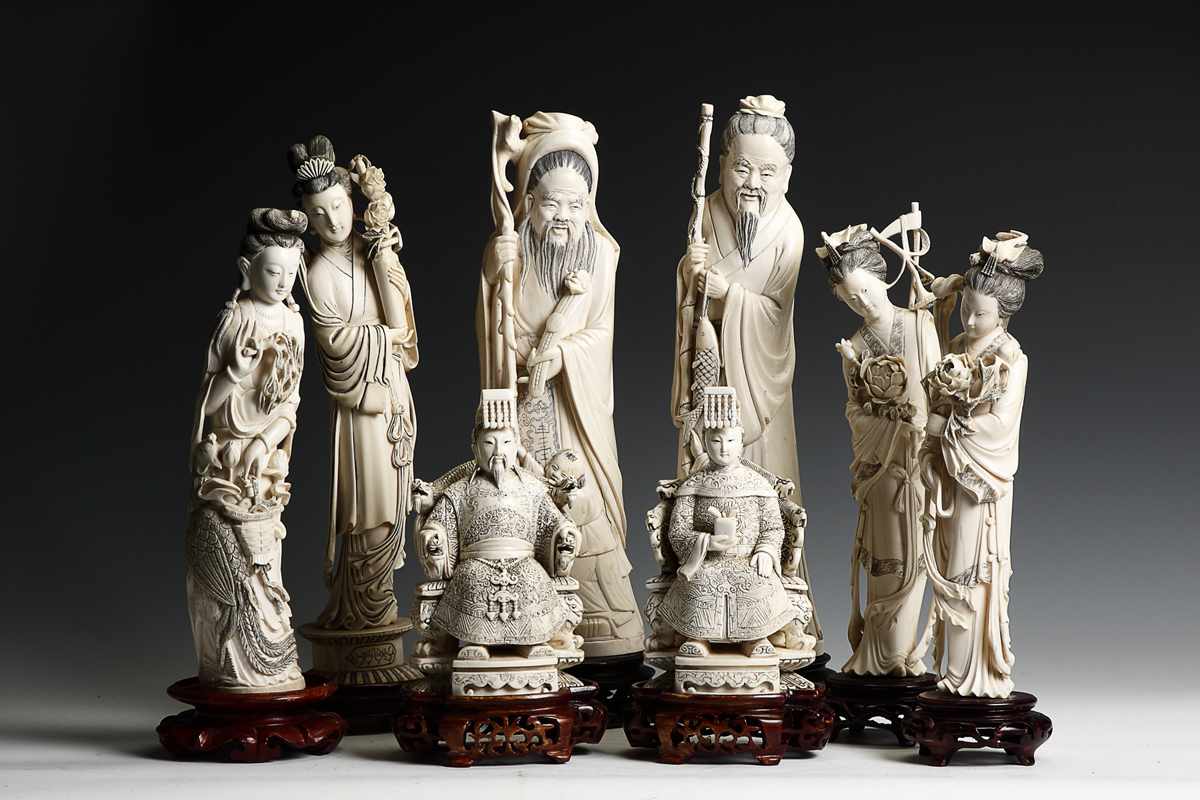 Appraisal: Carved Inked Ivory Seated Ming Officials th th cent In