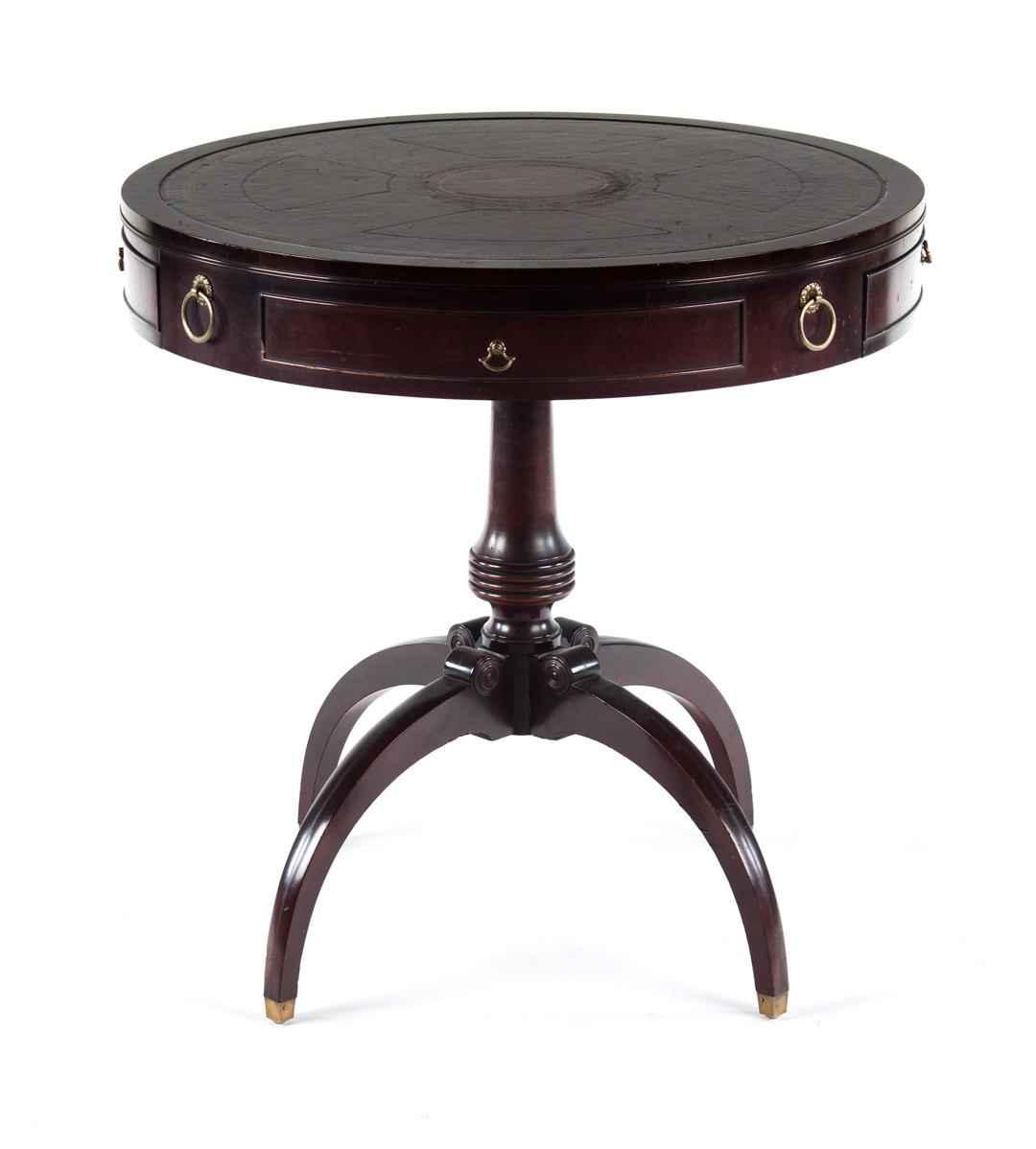 Appraisal: Regency style carved mahogany drum table in tooled leather inset