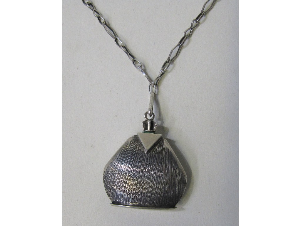 Appraisal: White metal scent bottle on chain