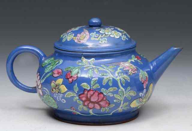 Appraisal: A YIXING TEAPOT with allover blue enamel ground and painted