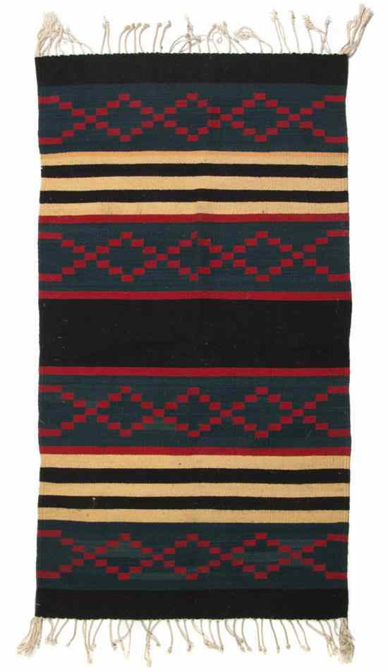 Appraisal: A Native American Blanket having linear decoration Height x width