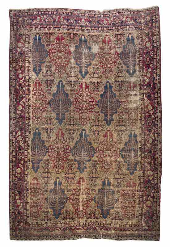 Appraisal: A Kirman Wool Carpet decorated with repeating Tree of Life