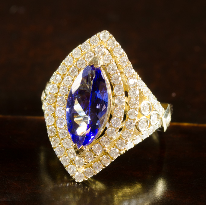 Appraisal: TANZANITE DIAMOND AND FOURTEEN KARAT GOLD RING the ct marquise