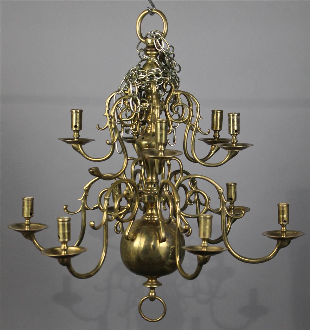 Appraisal: DUTCH STYLE TWO TIER LIGHT BRASS CHANDELIER having two tiers