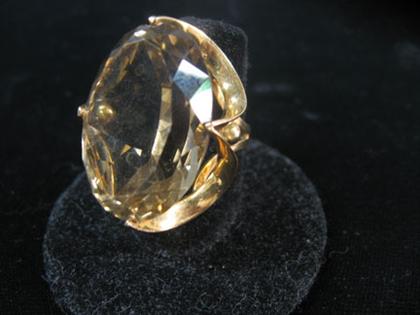 Appraisal: Topaz dinner ring Large oval facet cut topaz set in